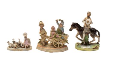 Late 19th century Staffordshire figure of Don Quixote along with two early 20th century German Spill