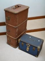 A 1920s travel trunk with travellers name along with a mid 20th Century tuck box