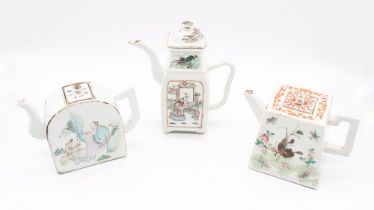 Three 19th century Chinese famille porcelain teapots in an unusual shape and decorated with