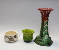 A late 19th century Bretby jardinière stand and pot, along with other porcelain pots and figures,(