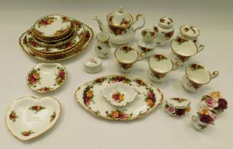 Royal Albert - A quantity of "old country roses" items include teapot, plates, cups and sauce and