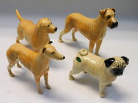 Four boxed Beswick dogs, Pug, Great Dane, Labrador and Greyhound.