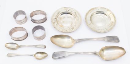 A collection of silver to include; Two similar circular silver pin dishes, each with engraved script