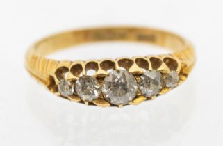 A diamond and 18ct gold boat head ring, comprising a row of graduated old cut diamonds, the centre