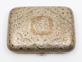 A late Victorian silver cigar case, having gilt interior and elaborate floral and foliage engraved