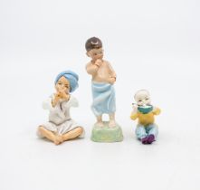 A collection of three Royal Worcester figures