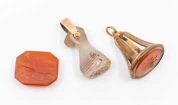 A collection of three 19th century hard stone seals to include a loose carnelian intaglio