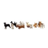 Collection of mixed small dog breeds by John Beswick, no boxes, eleven in total.