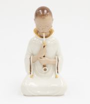 Royal Copenhagen figurine 'Opium smoker' no2342 modelled by Arno Malinowski. Marks to the base.