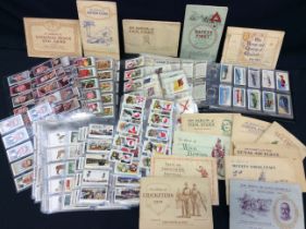 A collection of cigarette cards most from the 1930's to include Players, Kensitas, football,