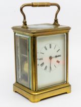 Late 19th century French brass chiming mantle clock. Two barrel movement, glazed sides and top