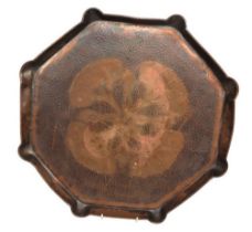 An Arts & Crafts octagonal stylised copper charger, hammered effect with central floral design. Most