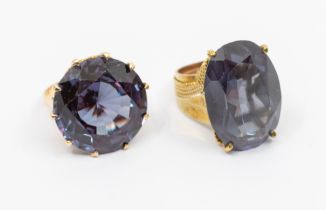 A vintage synthetic sapphire and gold ring, comprising a round mixed cut stone approx 19mm, claw set