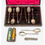 A collection of silver to include; a part cased set of five early Edwardian stylised Art Nouveau