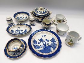 A Willow pattern dinner service to include plates, cups and saucers etc, also to include a Royal