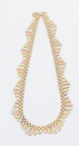 A 9ct gold tri colour fringe necklace, comprising a scalloped links of alternate red, yellow and