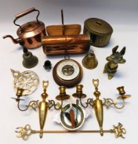 A collection of 19th and 20th century brass and copper wares, including bells, kettles, bed