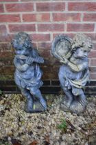 Two garden cherub ornaments.