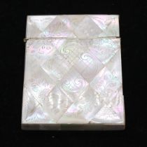 A rectangular mother of pearl card case, having engraved floral and foliage detail, (broken hinge,