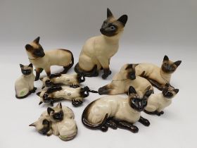 Collection of John Beswick siamese cats.