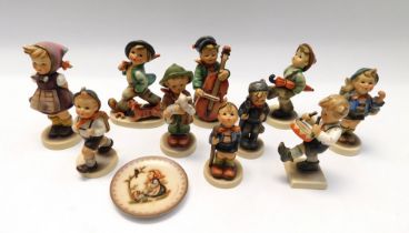 Goebel - A collection of Hummel figurines.