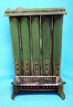 Early 20th century Art Nouveaux green metal radiator with ceramic base.