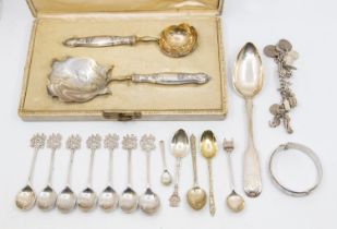 A collection of silver to include: a Swedish 18th Century fiddle and shell pattern table spoon,