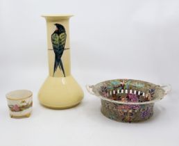 A 19th century Spode pierced porcelain twin handle bowl, heavily decorated with foliage and bird