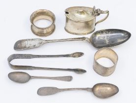 A collection of silver items to include; a Victorian silver fiddle patterned serving spoon,