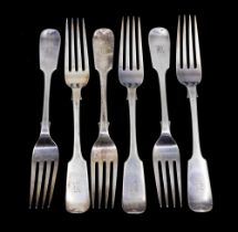 A set of six Victorian Scottish silver fiddle patterned dinner forks, all initialled to terminals,