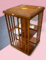 Reproduction Edwardian style mahogany revolving bookcase, with batwing detail. Along with two