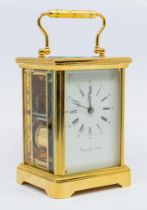 Asprey & Garrard - A boxed brass cased carriage clock, with 11 jewels workings and marked "