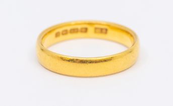 A 22ct gold wedding band, D shaped width approx 4mm, size N, weight approx 4.4gms Further details: