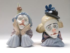 Lladro -Two Clown figure ceramic busts, both with frowning expressions, one with head in hands.