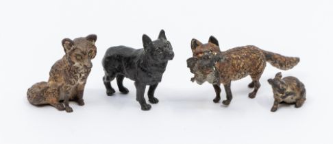 A small collection of four late 19th/early 20th century cold painted bronze figures to include; a