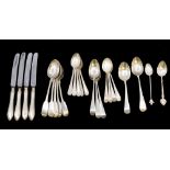 A collection of mixed silver flatware to include; three matching Victorian fiddle patterned