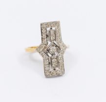 A diamond and 18ct gold Art Deo style dress ring, diamond set, the central principal  diamond approx