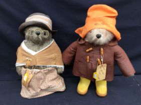 2 soft toys: Paddington Bear and one other