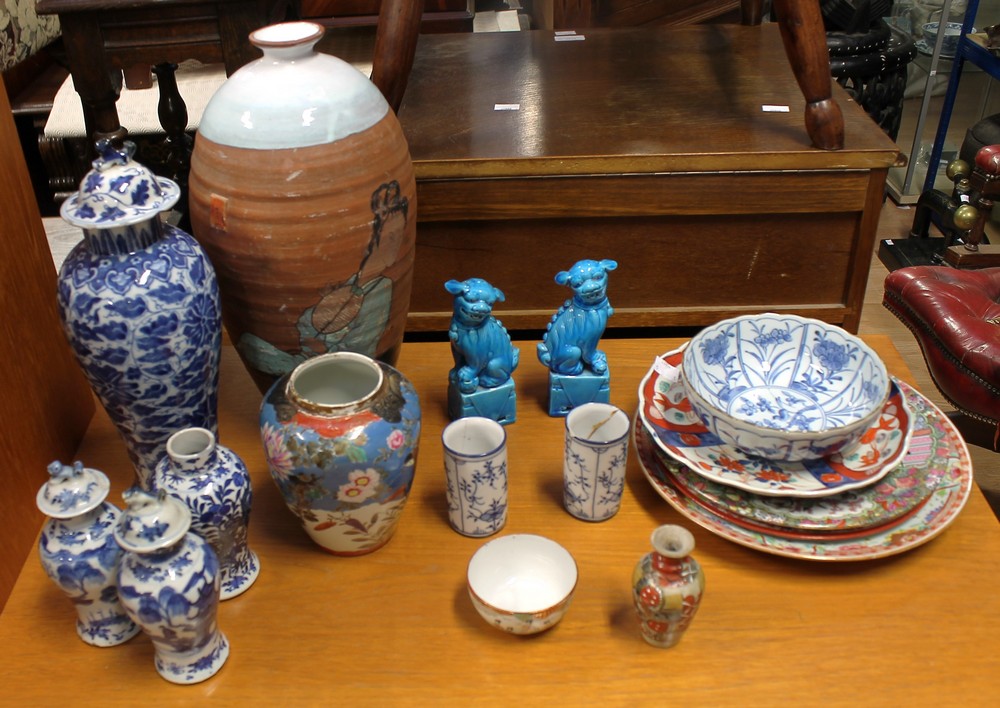 A group of Asian ceramics to include: Chinese blue and white baluster vases, some with covers,