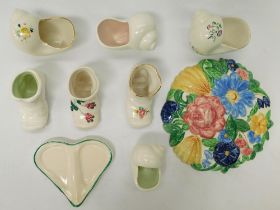 A small collection of Plichta, to include; four shells, three boots, a heart shaped tray with
