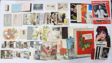 A collection of assorted postcards, christmas cards, programmes and more, mostly early to mid 20th