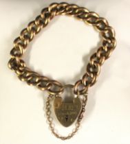 9ct Rose Gold Padlock bracelet with safety chain. The links are approx 1 inch in width.  The padlock