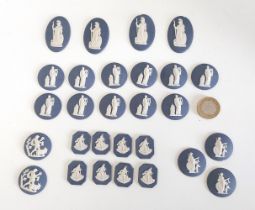 A collection of miniature Portland blue Wedgwood Jasperware cameos, back stamped Wedgwood made in