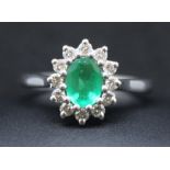 18ct White Gold Oval Brilliant Cut Emerald and Diamond Ring.  The Emerald is approx 7mm x 5mm.