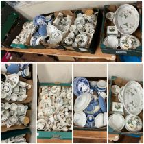 Five boxes of assorted ceramics including Wedgwood, Portmerrion, and others cups mugs, dishes