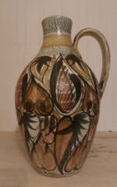 A large hand decorated Bourne Denby Stoneware Glyn Colledge hand decorated pitcher in autumnal