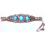 Unmarked gold Turquoise and Diamond Brooch.  Consists of three oval cabochon turquoises. Each approx