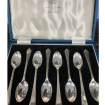 A set of eight silver teaspoons by Mappin and Webb, Sheffield 1942, 100g cased