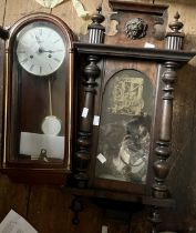 A 20th Century mahogany Hermle Vienna wall clock; another similar (2)