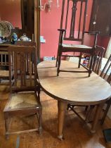 Oak Table and six chairs (two carvers)  high back chairs with rush seats, one carver needs
